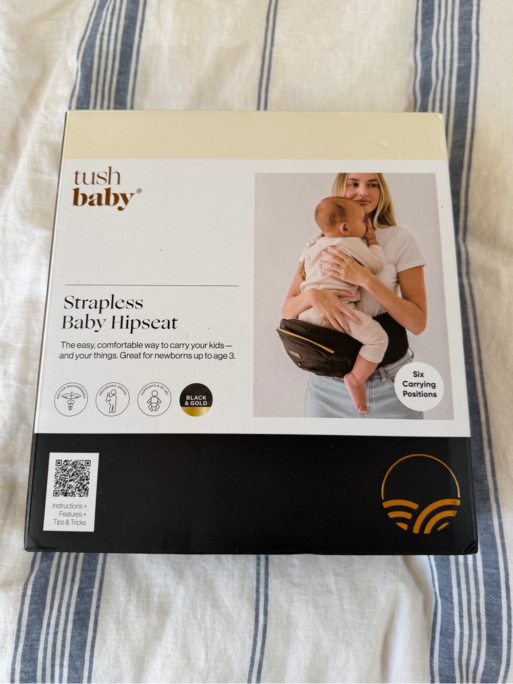TushBaby Hip Seat Carrier in Black & Gold